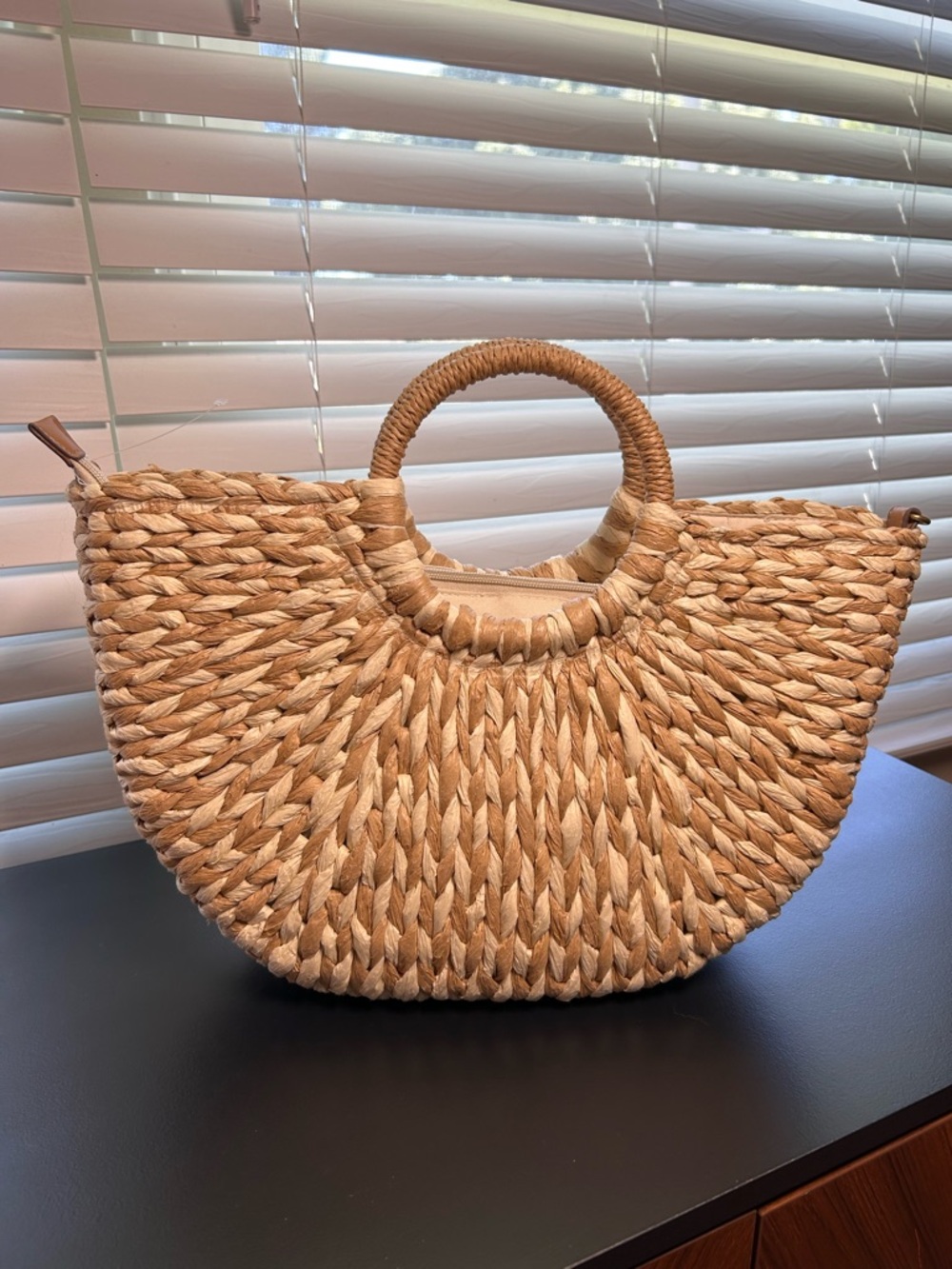 Style & Co Straw Tote Bag, chic rounded top handles, and a zipper closure.